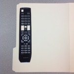 Cutout of TV Remote photocopy taped to a file folder