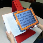 Justand magnifying a book-seated position