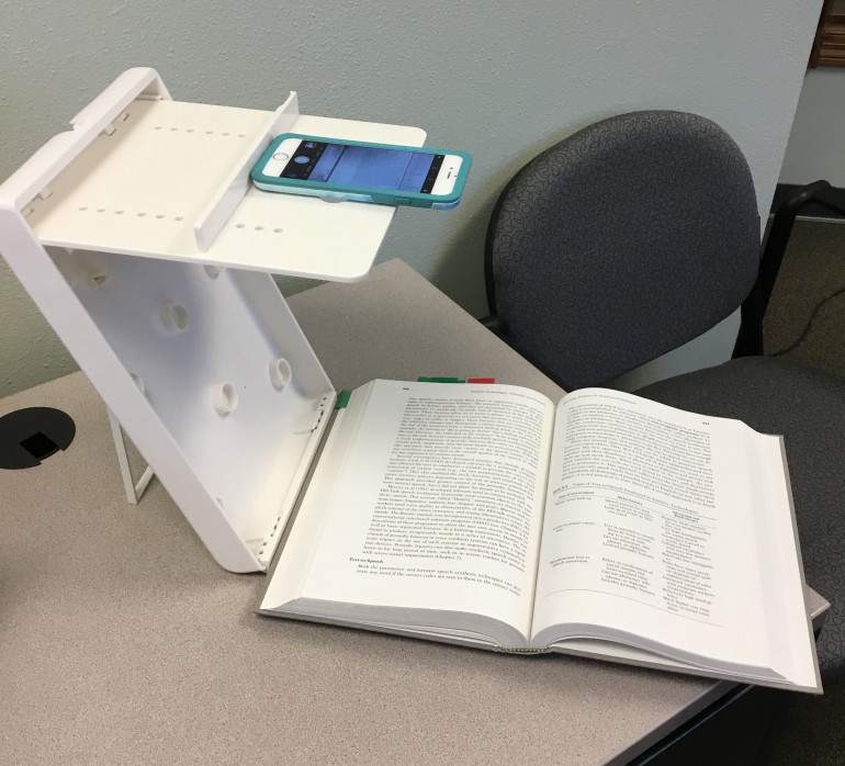 ScanJig and iPhone with book.