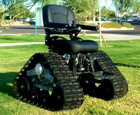 Power chair with military tank like wheels