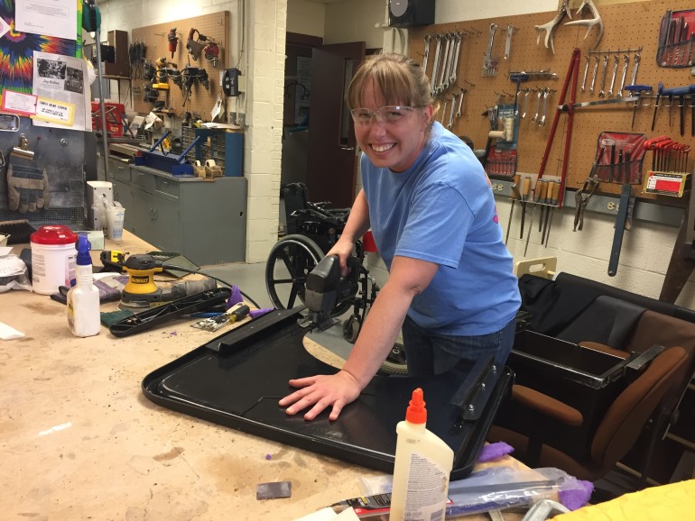 Emily from AES working on a tray