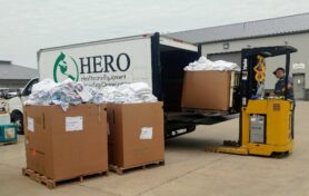 HERO truck being unloaded with donations