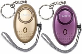 Photo of small round personal alarm buttons on keychain