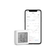 smart phone with a small square device / meter that shows the temperature and humidity