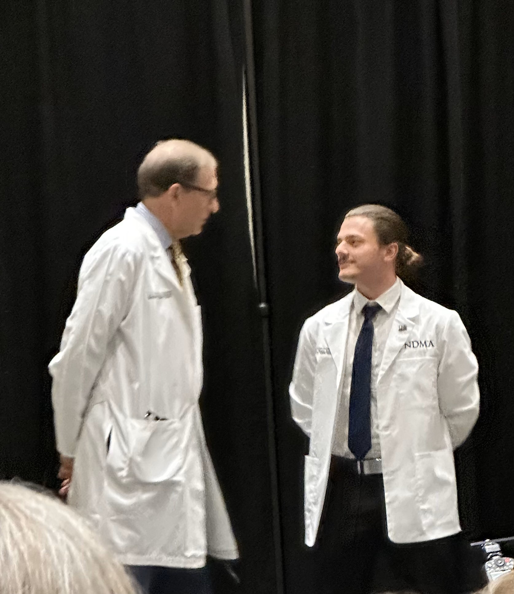 Paxton Franke is given his White Coat during a ceremony at the University of North Dakota School of Medicine.