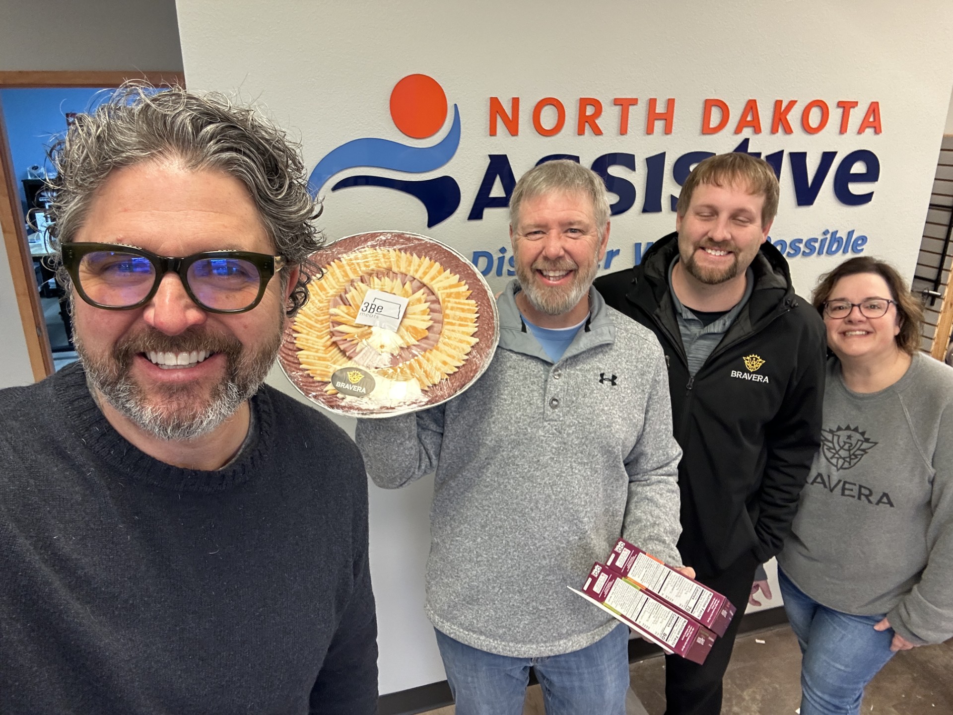 Bravera Bank's Marcus Ulmer and Amy Frison dropped of a meat and cheese tray for the Bismarck Demonstration Center.